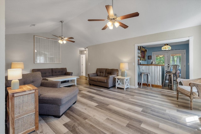 5052 Hidden Forest Ln, North Charleston, SC 29420 - living area with french doors, lofted ceiling, light wood finished floors, and ceiling fan