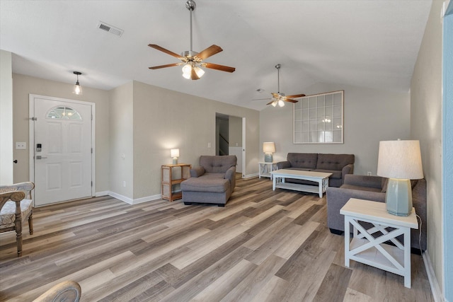 5052 Hidden Forest Ln, North Charleston, SC 29420 - living area featuring ceiling fan, vaulted ceiling, and light wood-style flooring