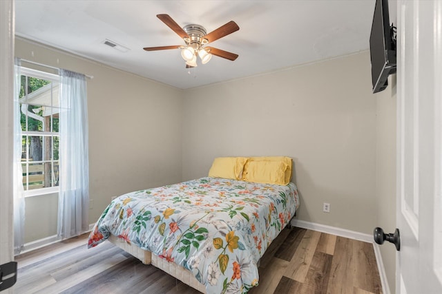 5052 Hidden Forest Ln, North Charleston, SC 29420 - bedroom featuring wood finished floors and a ceiling fan