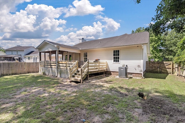 5052 Hidden Forest Ln, North Charleston, SC 29420 - rear view of house with a fenced backyard and a wooden deck