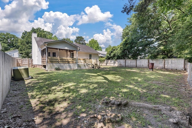 5052 Hidden Forest Ln, North Charleston, SC 29420 - back of property featuring a wooden deck, a fenced backyard, and a chimney