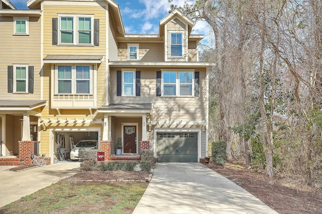 view of front of house featuring concrete driveway and a garage