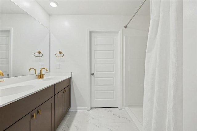 bathroom with a shower with curtain and vanity