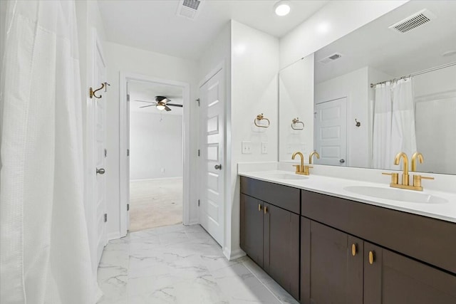 bathroom featuring vanity and ceiling fan