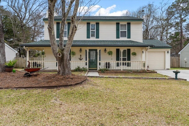 farmhouse with a porch, a front yard, fence, a garage, and driveway