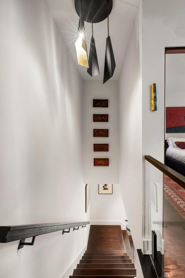 301 Broad St Unit 1, Charleston, SC 29401 - stairway featuring wood finished floors and baseboards