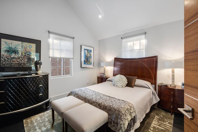 301 Broad St Unit 1, Charleston, SC 29401 - bedroom featuring high vaulted ceiling, wood finished floors, and baseboards