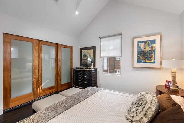 301 Broad St Unit 1, Charleston, SC 29401 - bedroom with high vaulted ceiling and wood finished floors