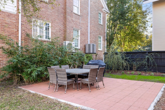 301 Broad St Unit 1, Charleston, SC 29401 - view of patio featuring central air condition unit and outdoor dining space