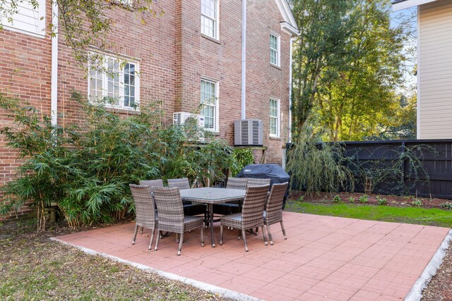 301 Broad St Unit 1, Charleston, SC 29401 - view of patio / terrace with cooling unit and outdoor dining space
