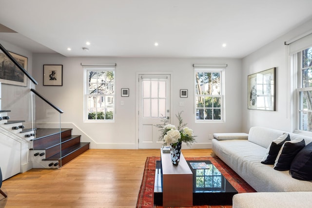 301 Broad St Unit 1, Charleston, SC 29401 - living area featuring stairs, wood finished floors, recessed lighting, and baseboards