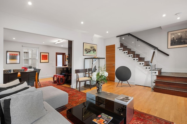 301 Broad St Unit 1, Charleston, SC 29401 - living room with stairs, baseboards, recessed lighting, and wood finished floors