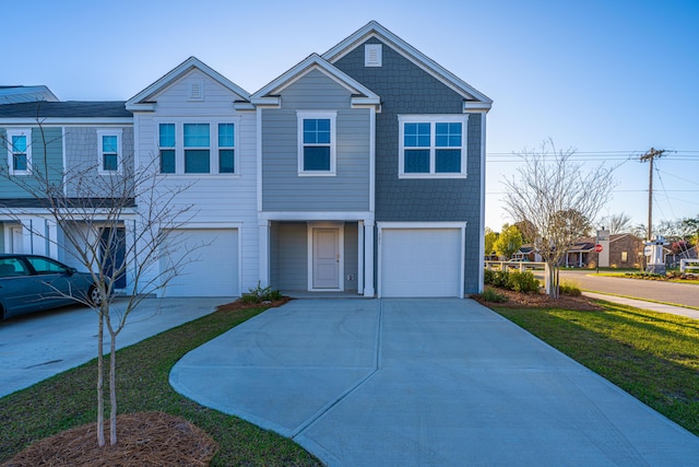 101 Orchid Bloom Cir, Moncks Corner, SC 29461 - view of front of property featuring concrete driveway, a garage, and a front yard