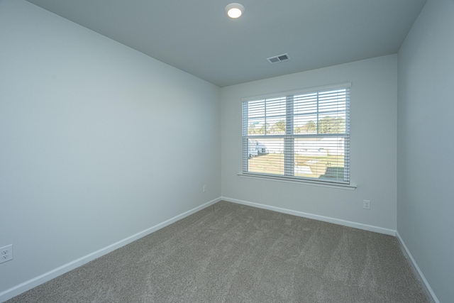 101 Orchid Bloom Cir, Moncks Corner, SC 29461 - empty room featuring baseboards and dark carpet