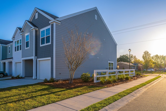 101 Orchid Bloom Cir, Moncks Corner, SC 29461 - view of side of property featuring an attached garage and driveway