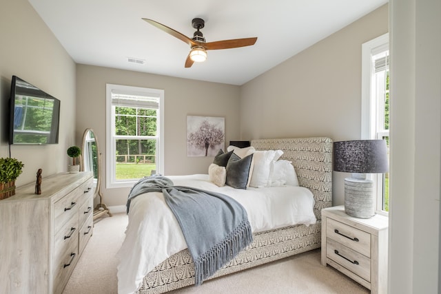 125 Beam St, Huger, SC 29450 - bedroom with light carpet, baseboards, and ceiling fan
