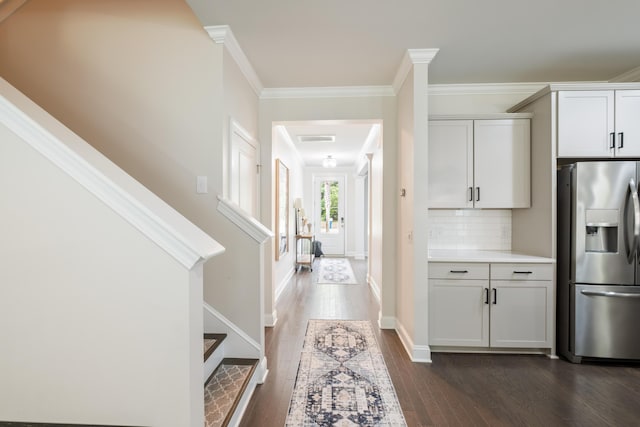 125 Beam St, Huger, SC 29450 - hallway featuring dark wood-style flooring, stairway, crown molding, and baseboards