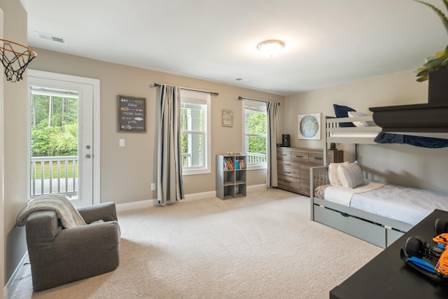 125 Beam St, Huger, SC 29450 - bedroom with carpet flooring, baseboards, and access to exterior