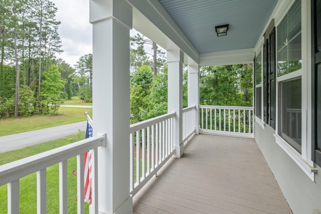 125 Beam St, Huger, SC 29450 - covered porch featuring view of scattered trees