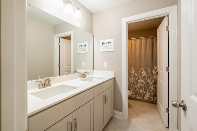 125 Beam St, Huger, SC 29450 - full bath with double vanity, tile patterned flooring, baseboards, and a shower with curtain