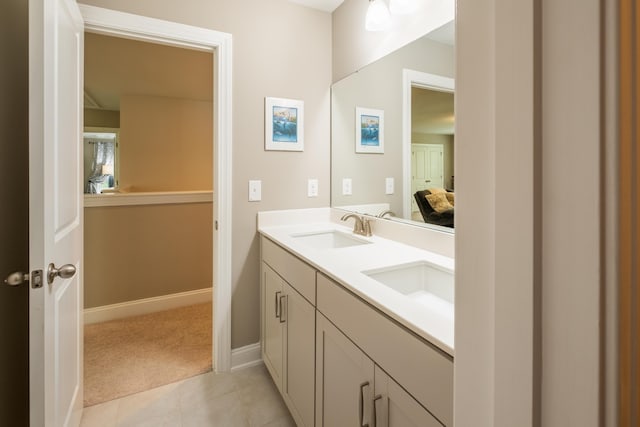 125 Beam St, Huger, SC 29450 - ensuite bathroom with double vanity, baseboards, and tile patterned flooring