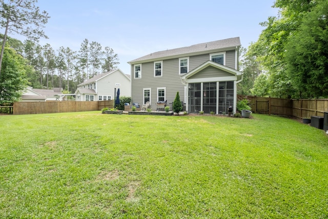125 Beam St, Huger, SC 29450 - back of property with a sunroom