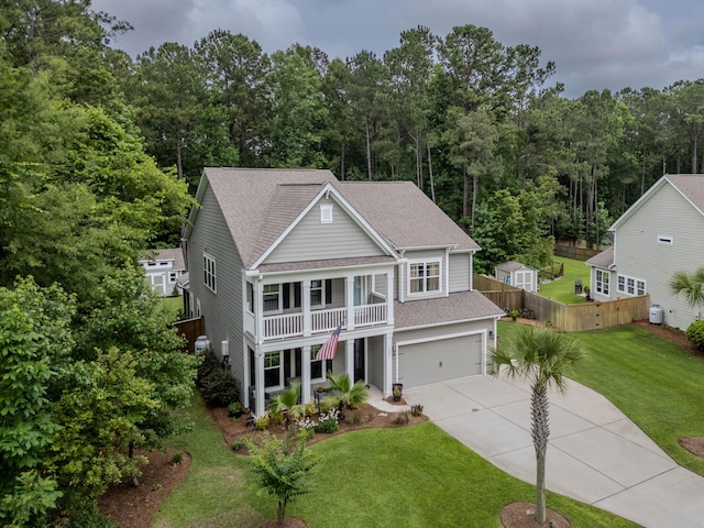 125 Beam St, Huger, SC 29450 - view of front of home with driveway, an attached garage, a porch, and roof with shingles