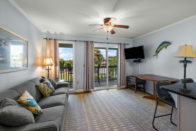 living room featuring ceiling fan and ornamental molding