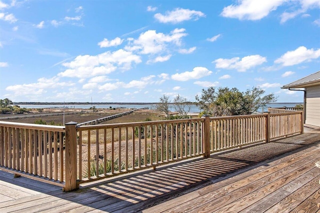 deck featuring a water view