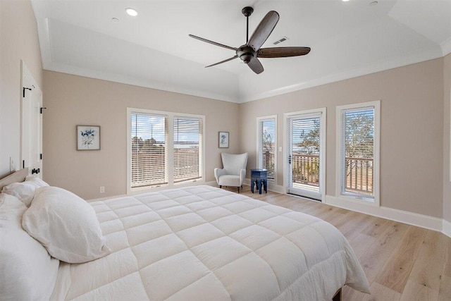 bedroom featuring light hardwood / wood-style flooring, ceiling fan, ornamental molding, access to outside, and vaulted ceiling