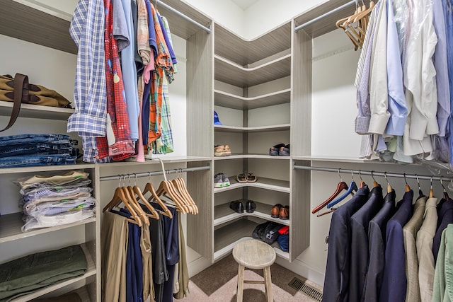 walk in closet with carpet and visible vents