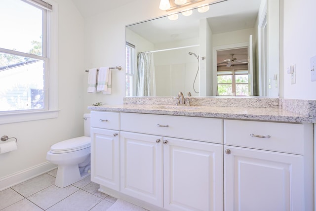 full bathroom featuring vanity, a shower with curtain, baseboards, tile patterned flooring, and toilet