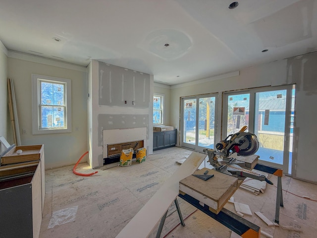 interior space with crown molding