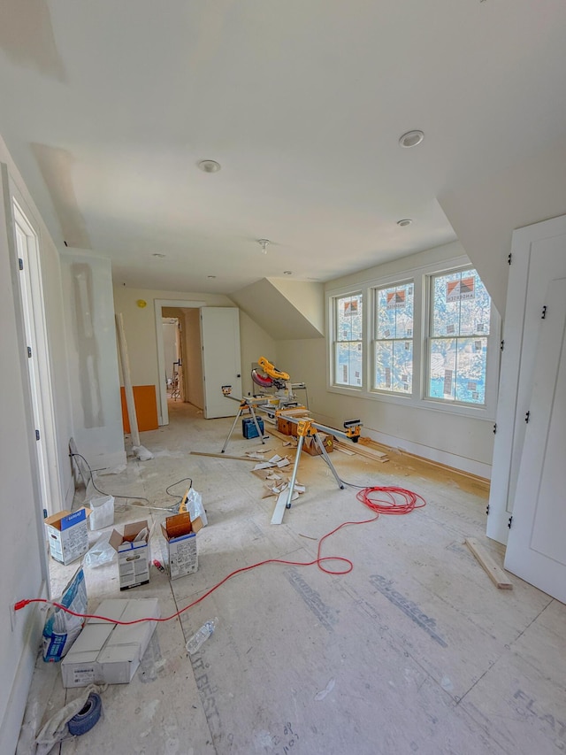 interior space featuring baseboards