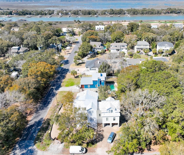 birds eye view of property featuring a residential view and a water view