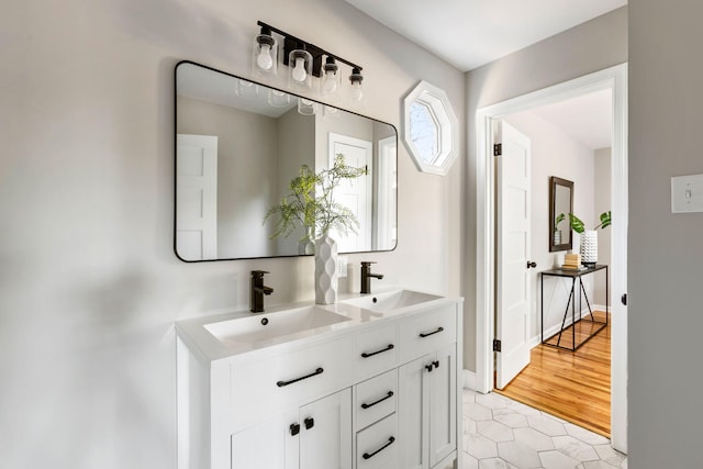 bathroom featuring tile patterned floors and vanity