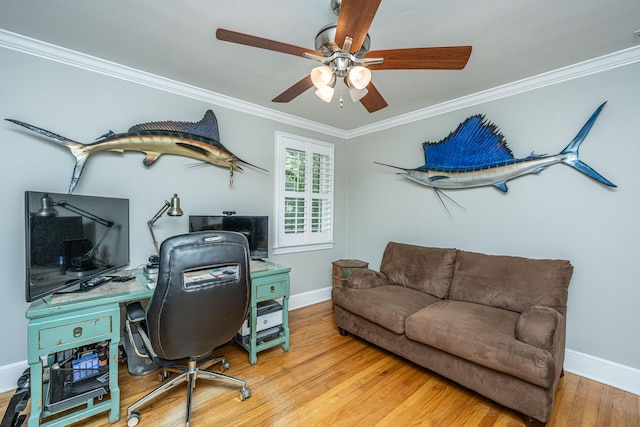 home office with baseboards, ceiling fan, wood finished floors, and crown molding