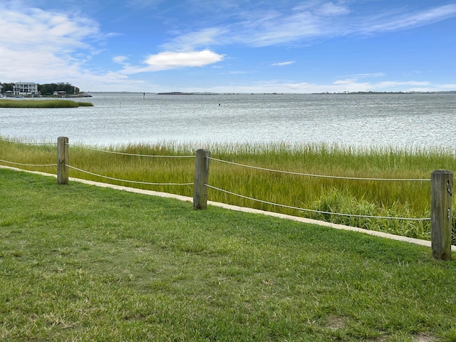 property view of water with fence