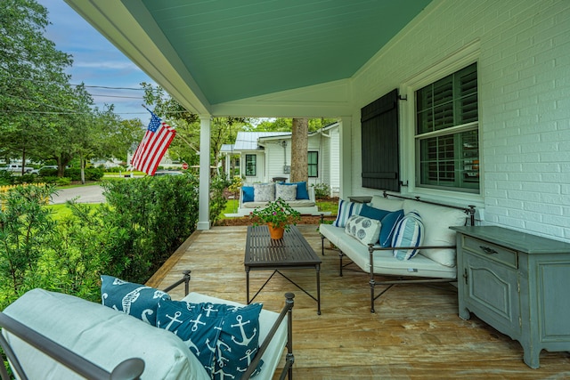 view of patio featuring covered porch and an outdoor hangout area