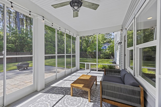 1166 Turkey Trot Dr, Johns Island, SC 29455 - sunroom / solarium featuring an outdoor living space with a fire pit and a ceiling fan