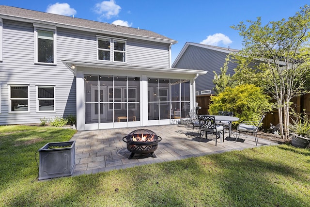 1166 Turkey Trot Dr, Johns Island, SC 29455 - rear view of property with a patio area, an outdoor fire pit, a sunroom, and a yard