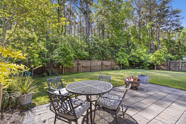 1166 Turkey Trot Dr, Johns Island, SC 29455 - view of patio featuring a fenced backyard and an outdoor fire pit