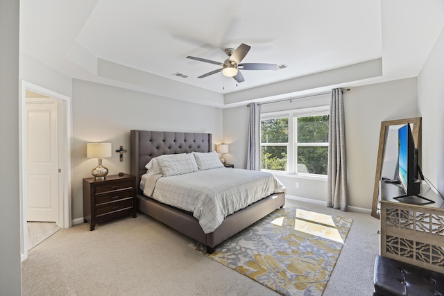 1166 Turkey Trot Dr, Johns Island, SC 29455 - bedroom featuring light carpet, baseboards, visible vents, a ceiling fan, and a raised ceiling