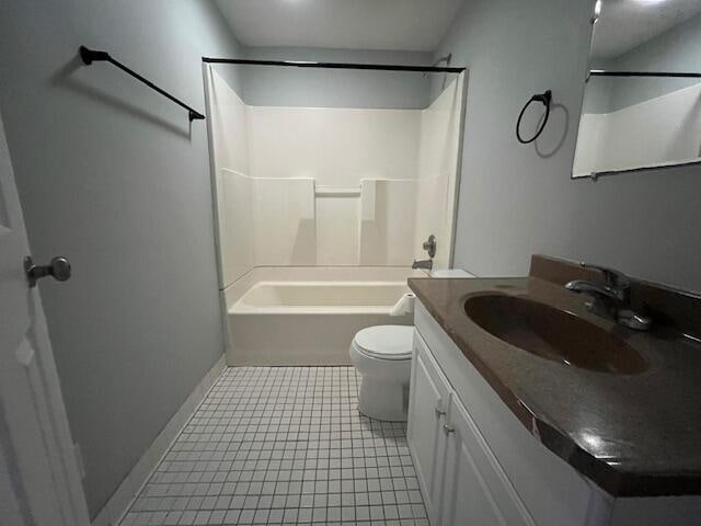 full bathroom featuring shower / bath combination, tile patterned floors, vanity, and toilet