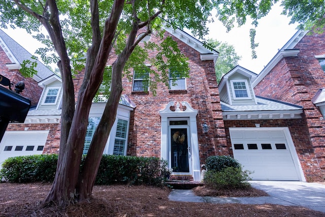 760 Natchez Cir, Mount Pleasant, SC 29464 - view of front of property with driveway, a garage, and brick siding