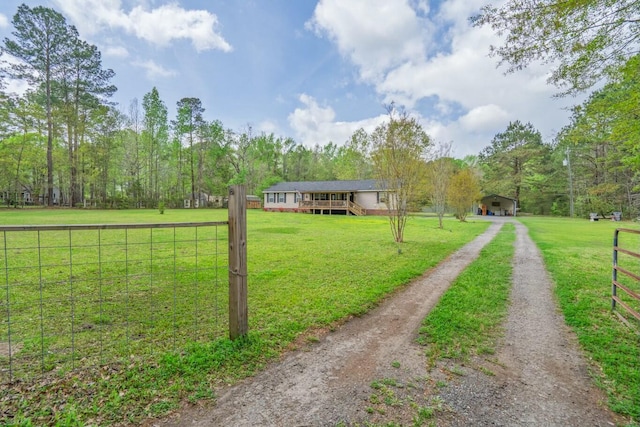 8072 Bing Hill Rd, Adams Run, SC 29426 - exterior space featuring fence, a front yard, dirt driveway, and a rural view