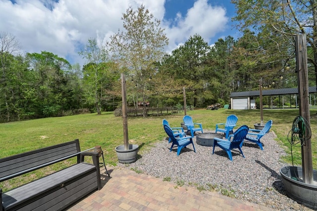 8072 Bing Hill Rd, Adams Run, SC 29426 - view of yard with an outbuilding, an outdoor fire pit, and a patio area