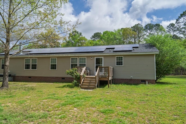 8072 Bing Hill Rd, Adams Run, SC 29426 - rear view of property featuring solar panels, a yard, crawl space, and a deck