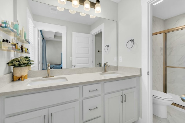 bathroom featuring toilet, walk in shower, and vanity