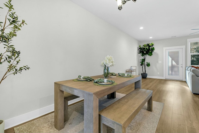 dining space with light wood-type flooring